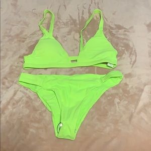 Bright yellow bikini. Never worn. NWT